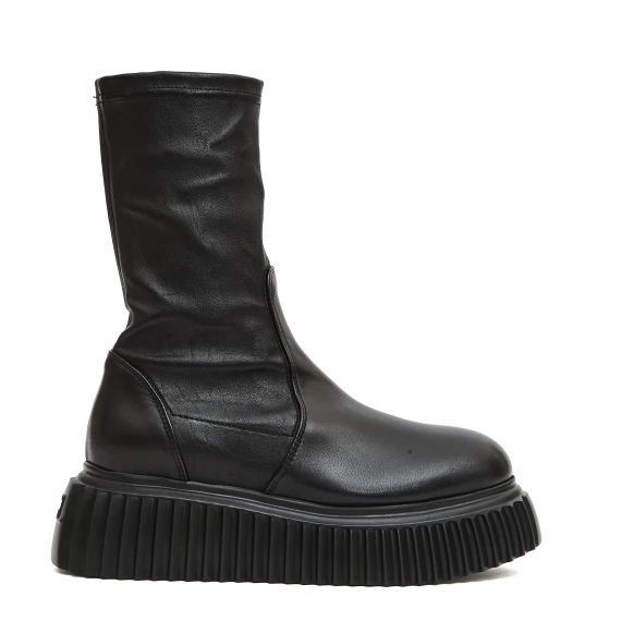 stivaletto stretch nera e suola in gomma a righe