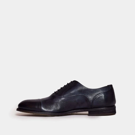 Stringata in pelle blu washed